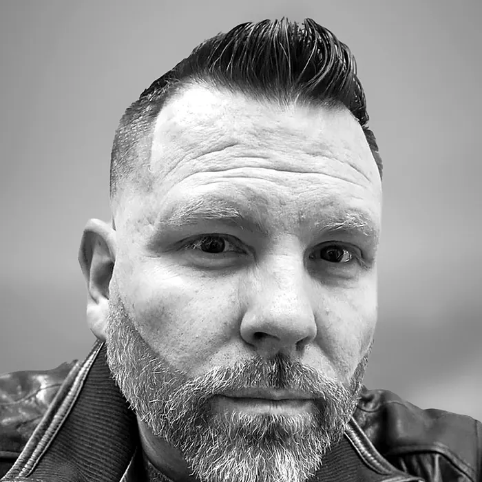 Black-and-white portrait of Craig Smith