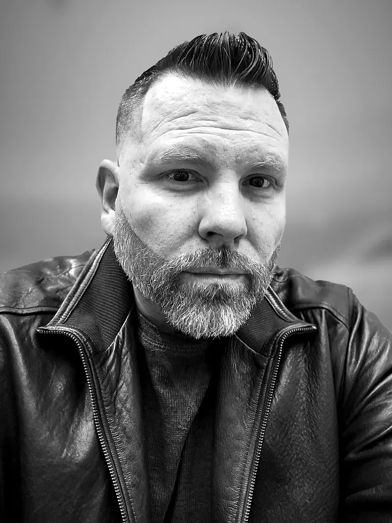 Black-and-white portrait of Craig Smith, CLI